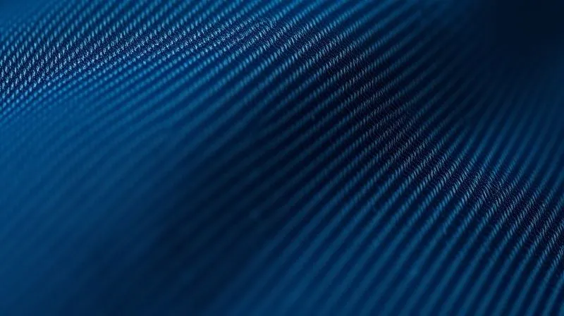 photorealistic, professional photography, 8K, cinematic lighting, sharp focus on the intricate weave and texture of heavy indigo 1970s selvedge denim, depth of field blurring the background, shot on a high-end DSLR, showing subtle slub and natural wear.