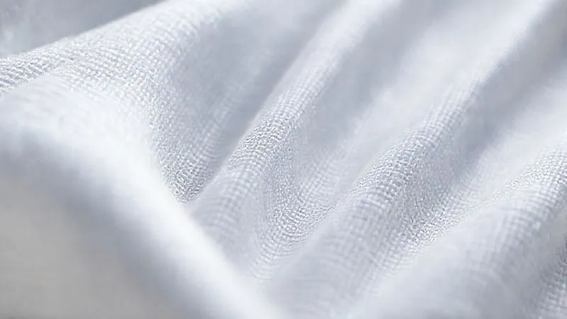 Photorealistic close-up of a virtual fabric swatch with intricate texture and realistic drape, showcasing PBR rendering and subtle light interaction, 8K, cinematic lighting, sharp focus on the fabric fibers, depth of field.