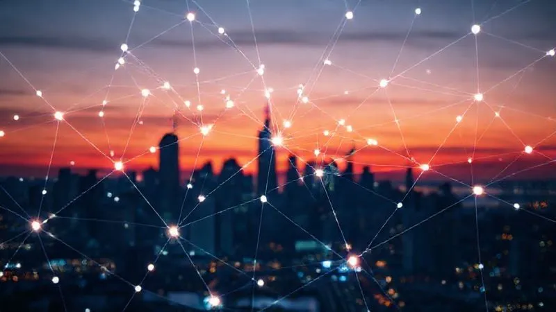 A photorealistic image of a complex, interconnected web of glowing lines and nodes, representing data streams and trend signals, overlaid on a silhouette of a city skyline at dusk. Professional photography, 8K, cinematic lighting, sharp focus on the central node, depth of field blurring the background, shot on a high-end DSLR.