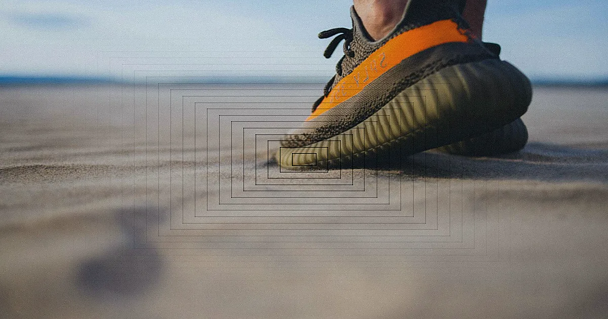 Black and yellow Air Jordan sneakers displayed with focus on design details against a dark background. — Foto: Terrance Barksdale / Pexels